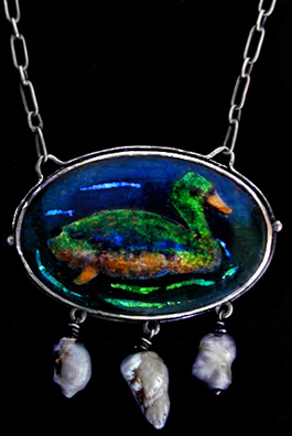 A Silver Pendant Collection of Antique Jewellery by Famous Artists