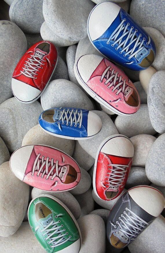 Beautiful shoes painted on stones