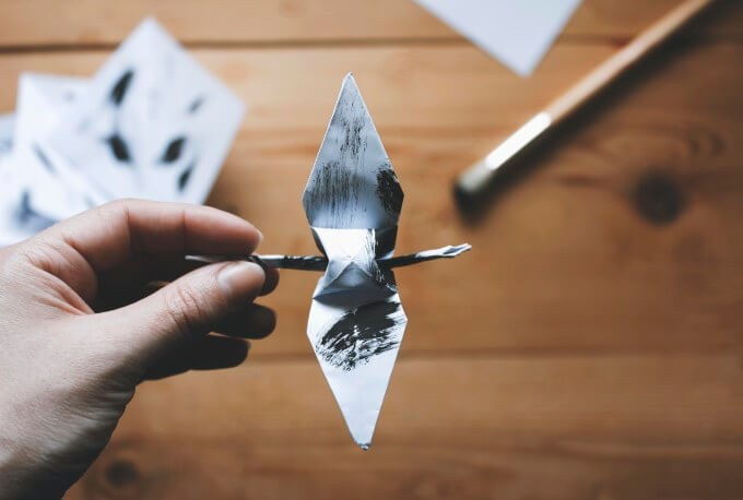 Origami-crane-and-twig-Origami Crane (bird) and twig