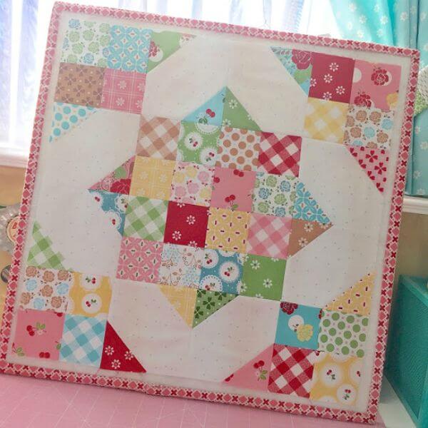 Scrappy Cross Roads Block - The quilt has a fairly tale to whisper